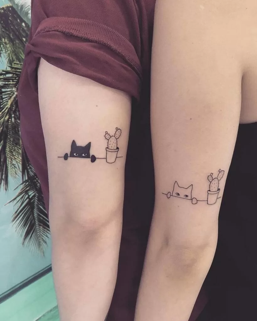 Amazing Friendship Tattoo Designs 2023 : एक बिल्ली और कैक्टस का पौधा