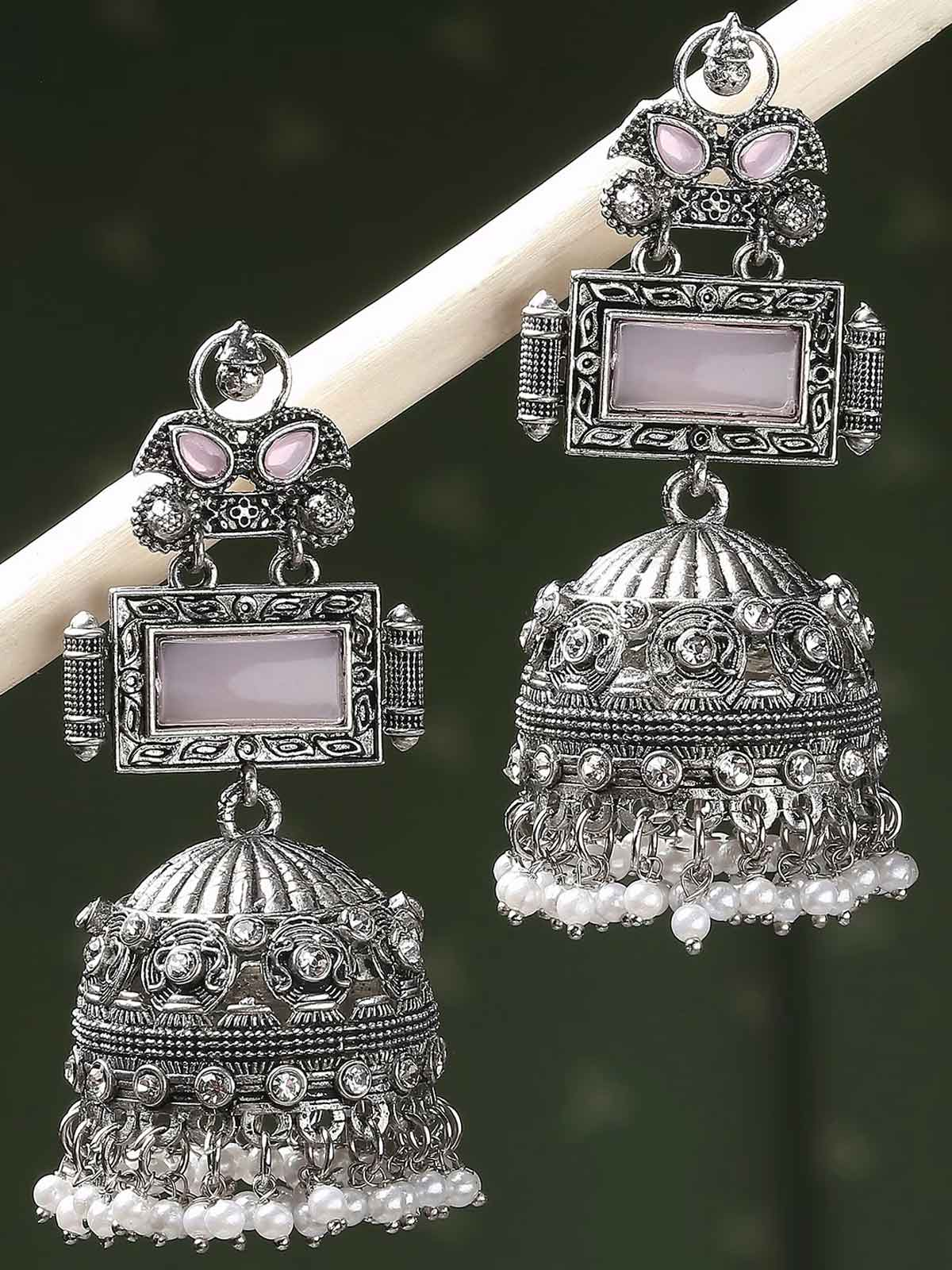 Wear these earrings with black heavy work saree