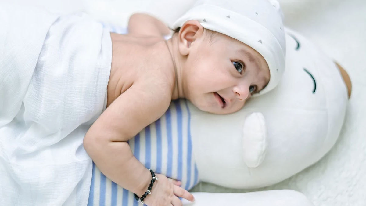 Why are silver bangles considered important in the hands and feet of small children?