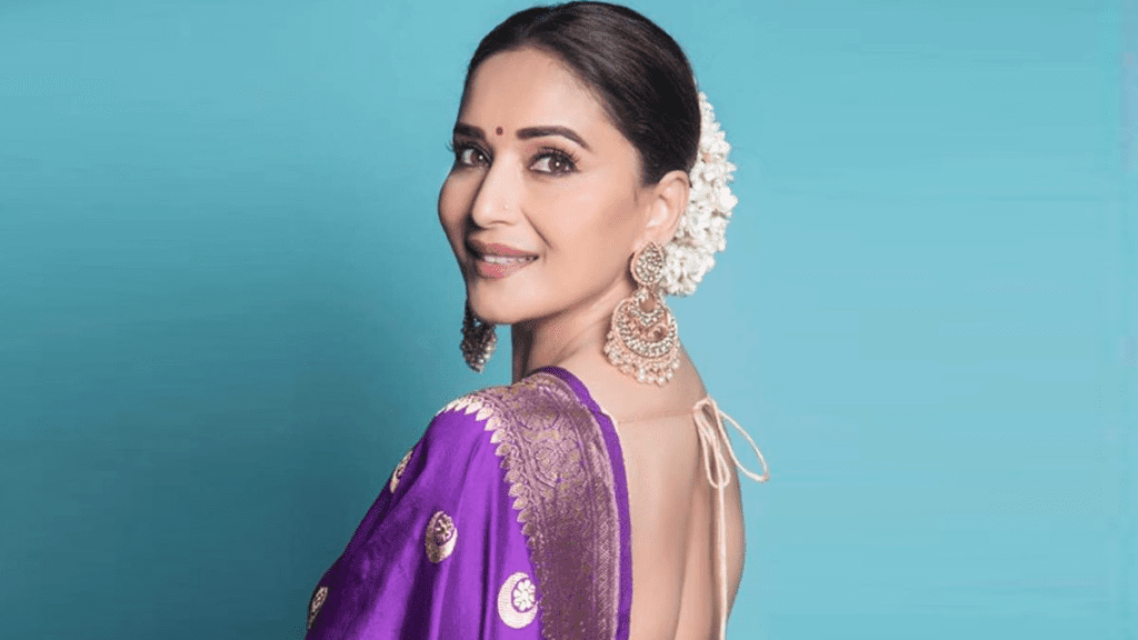 heavy earrings with plain saree